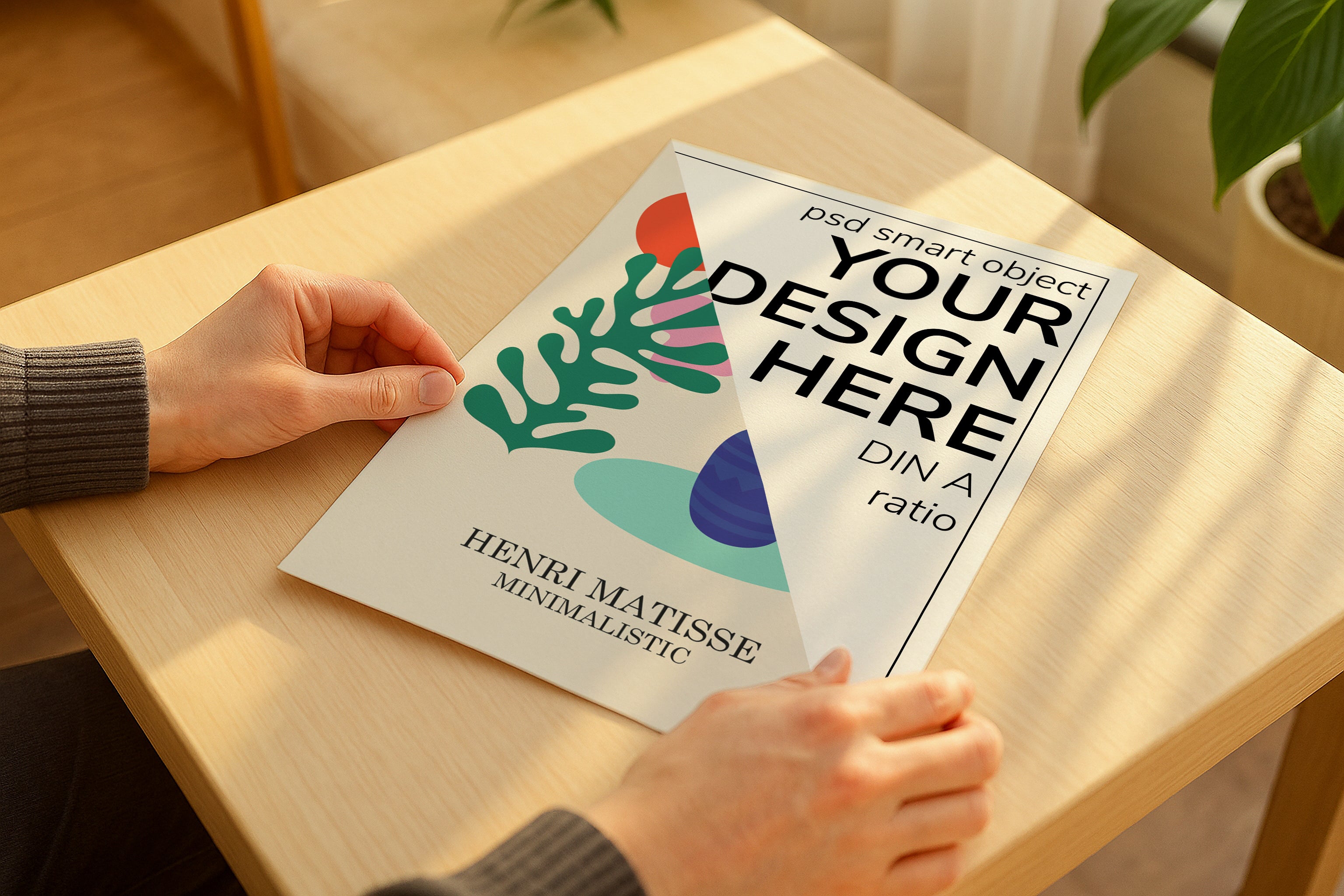 Poster mockup in hands on wooden table with sunlight, minimalistic A4 A3 artwork mockup, modern PSD template for printable wall art and graphic design.